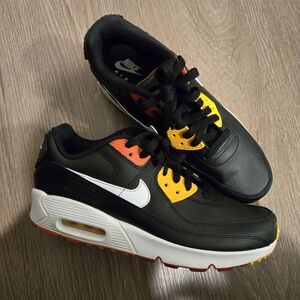 Nike Air Max Black Sneakers with Orange and Yellow Accents